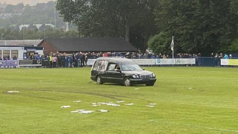 A hearse on Dunston's pitch