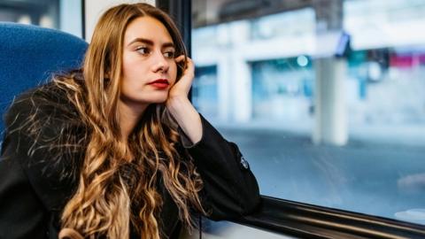 Woman train passenger