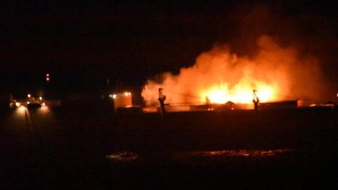 Burning container ship