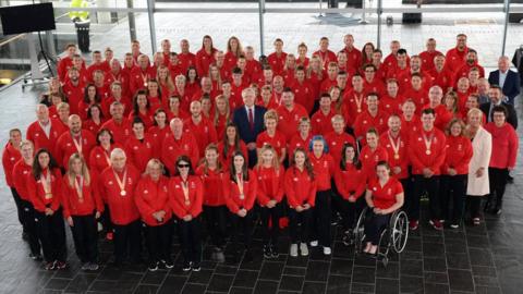 Members of Team Wales athletes with Carwyn Jones in the Senedd