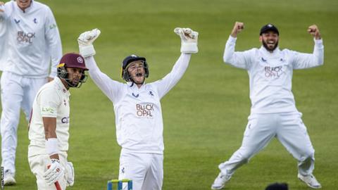 Kent wicketkeeper Ollie Robinson celebrates the lbw dismissal of Emilio Gay