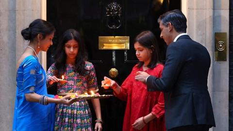 The prime minister, his wife Akshata Murty and two daughters mark the Hindu festival of lights.