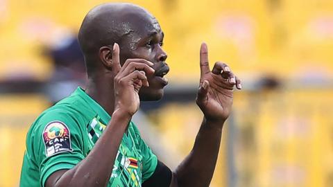 Knowledge Musona celebrates his goal against Guinea