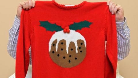 Christmas jumper with a Christmas pudding