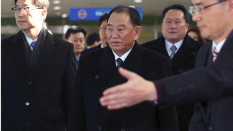 Kim Yong Chol (C), who leads a North Korean high-level delegation to attend the Pyeongchang 2018 Winter Olympic Games closing ceremony, arrives at the inter-Korea transit office in Paju on 25 February 2018