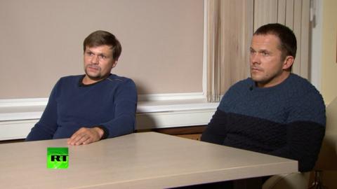 A still image taken from a video footage and released by RT international news channel on September 13, 2018, shows two Russian men with the same names, Alexander Petrov and Ruslan Boshirov, as those accused by Britain over the case of former Russian spy Sergei Skripal and his daughter Yulia, during an interview at an unidentified location
