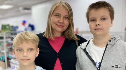 Olga Gromova and sons, Glen, aged nine, and Bogdan, aged 12, from Odessa