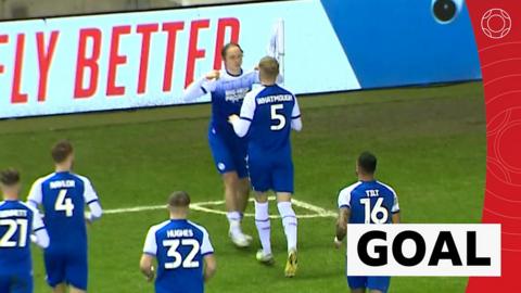 Thelo Aasgaard puts Wigan with sensational strike.