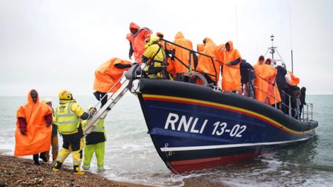 A group of people thought to be migrants are brought in to Dungeness, Kent in December 2022