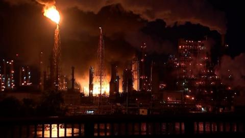 An early morning explosion woke locals and shook homes near a Philadelphia refinery when it caught fire.