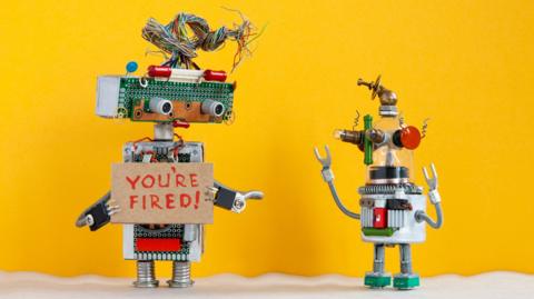 A robot made of spare parts tells another: "You're fired"