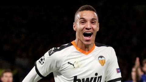 Rodrigo celebrates scoring for Valencia against Chelsea in the Champions League