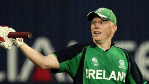 Kevin O'Brien acknowledges the applause after reaching the 100-mark during his record-breaking innings in Bangalore