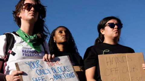 Women take part in a pro-choice abortion protest in Tucson, Arizona