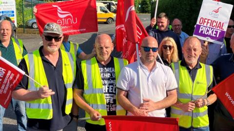 Striking Unite members at the Education Authority transport depot in Enniskillen