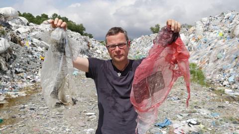 Hugh with plastic waste