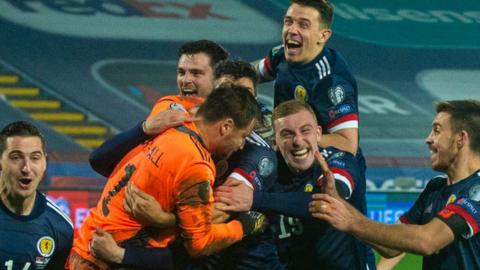 Scotland celebrate David Marshall's winning save