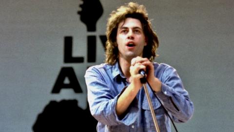 Bob Geldof on stage at Live Aid in 1985