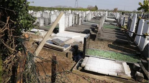 Damaged graves at Jewish cemetery