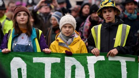 Greta Thunberg leads the crowds through Bristol city centre