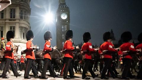 Soldiers marching past Big Ben