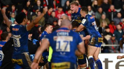 Exeter players celebrate