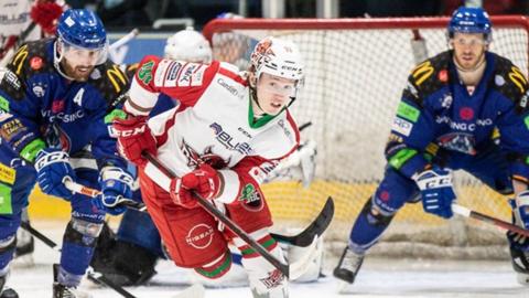 Devils forward Josh Waller battles up the ice in front of the Blaze goal