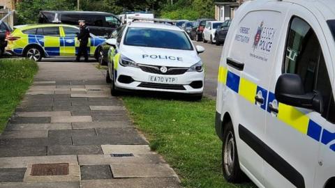Police cars at Joyners Field, Harlow, Essex