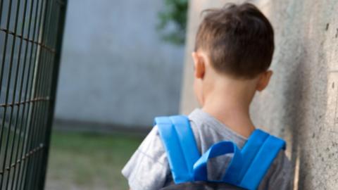 Stock image of a child with a rucksack