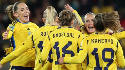 Sweden's players celebrate scoring against Italy at the Women's World Cup