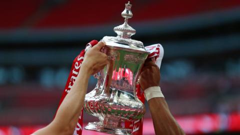 Players hold the FA Cup