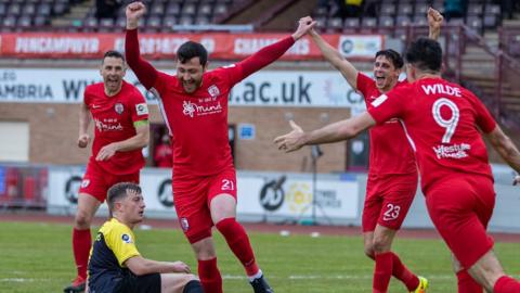 Connah's Quay Nomads' Aron Williams celebrates after scoring his side's second