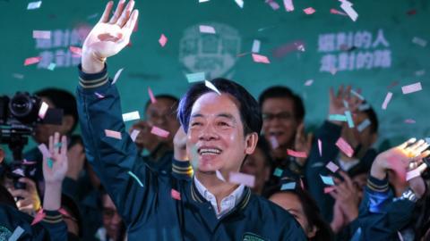 Confetti flies over the stage and crowd as Taiwan's Vice President and presidential-elect from the Democratic Progressive Party (DPP) Lai Ching-te speaks to supporters at a rally at the party's headquarters on January 13, 2024 in Taipei