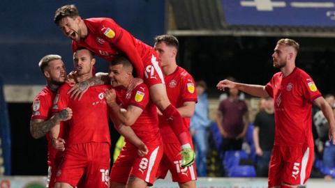 Wigan celebrate taking the lead against Ipswich