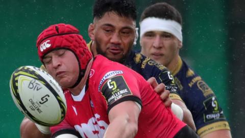 Cardiff flanker James Botham compet3s for possession against Benetton