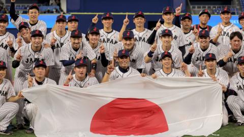 Japan baseball team celebrate winning gold in men's baseball