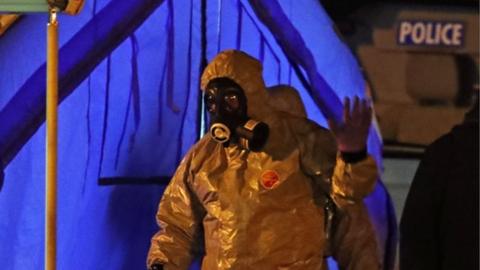 Investigators next to a police tent outside the Mill pub at the Maltings in Salisbury near to where former Russian double agent Sergei Skripal was found critically ill