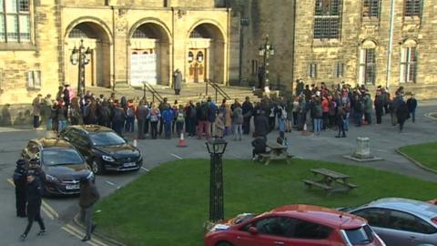 Protestors outside the university