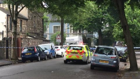 A police car and cordon on Oakfield Street, Roath