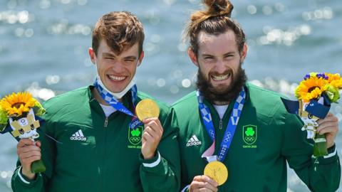 Paul O'Donovan and Fintan McCarthy celebrate winning gold