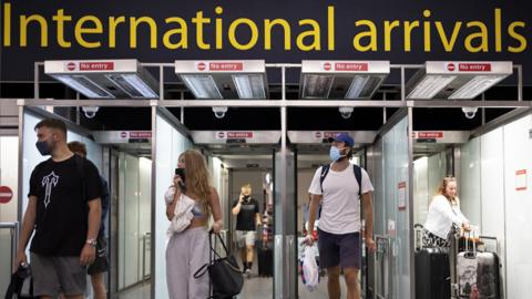 People arriving at Gatwick Airport