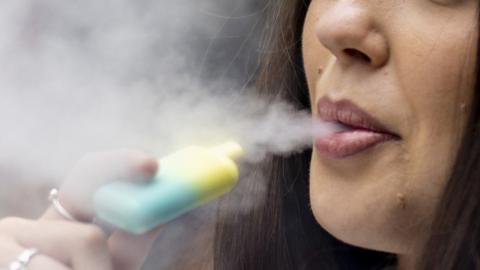 A woman vaping