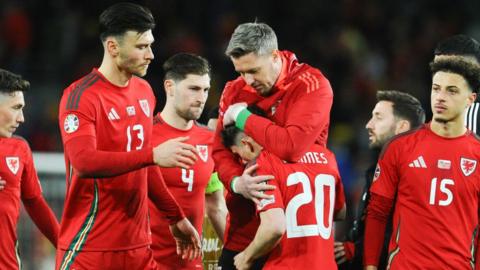 wales dejected after losing euros playoff