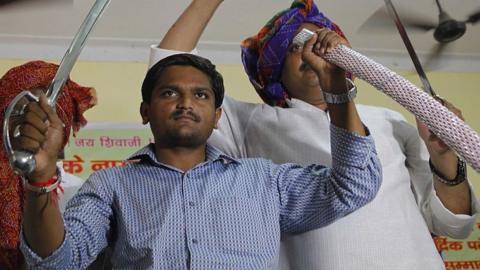 Hardik Patel, Convener of Patidar Anamat Andolan Samiti (PAAS) being felicitated by Gurjar Community at Kotla Village, Gurjar Bhawan near Patparganj, on August 30, 2015 in New Delhi, India. Patel announced that he won't allow any political party to join his agitation and he wants to turn the stir into a national movement.