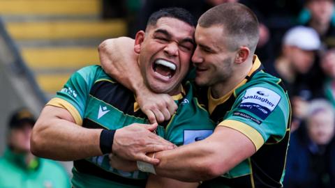 Sam Matavesi celebrates a try