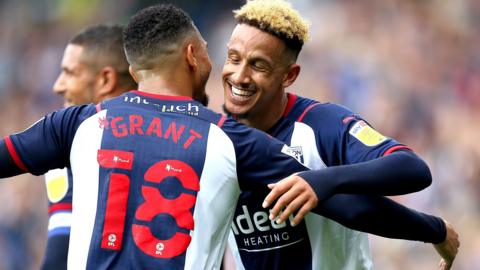 Karlan Grant's socially distanced celebration with Callum Robinson, scorer of West Brom's second goal against Luton