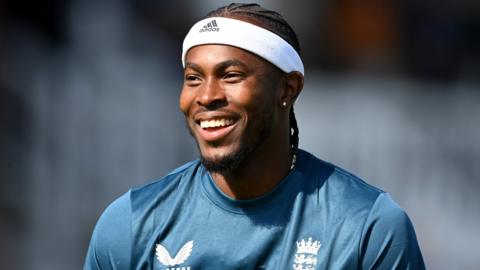 England fast bowler Jofra Archer smiles during training