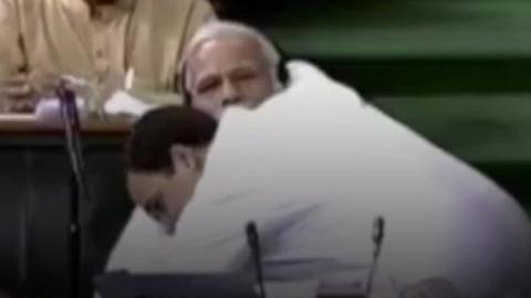 Modi being hugged by Rahul Gandhi