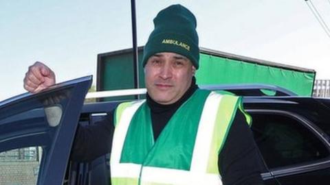 Jonathan Ganesh with donated support ambulance