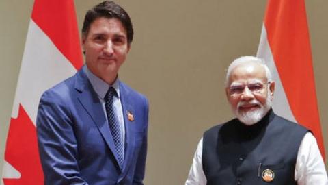 India's Prime Minister Narendra Modi (R) and his Canada counterpart Justin Trudeau shake hands during a bilateral meeting after the G20 Summit in New Delhi on September 10, 2023.